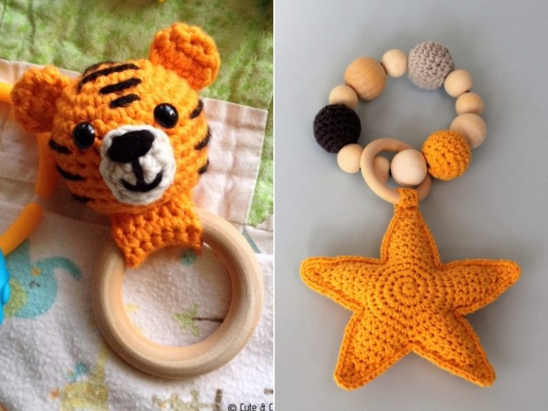 A crocheted tiger, starfish and a wooden rattle.