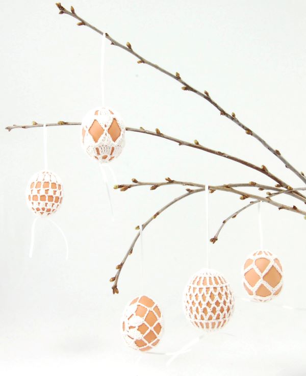 white lacy crochet easter egg decoration
