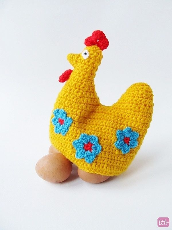 yellow Easter Crochet Hen egg cozy with blue crochet flowers