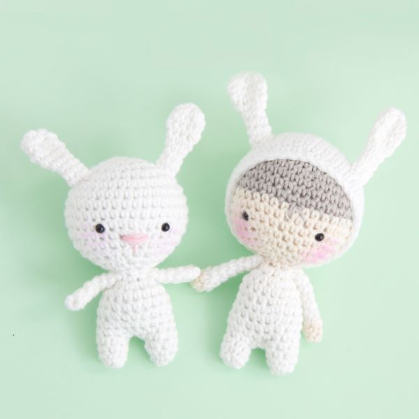 two easter amigurumi toys with bunny ears