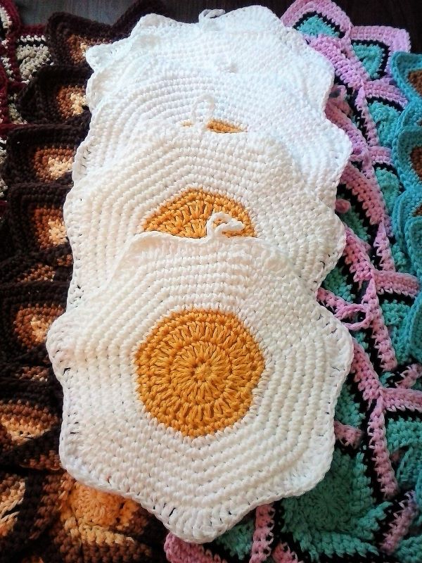 white and yellow sunny side up egg crochet potholders