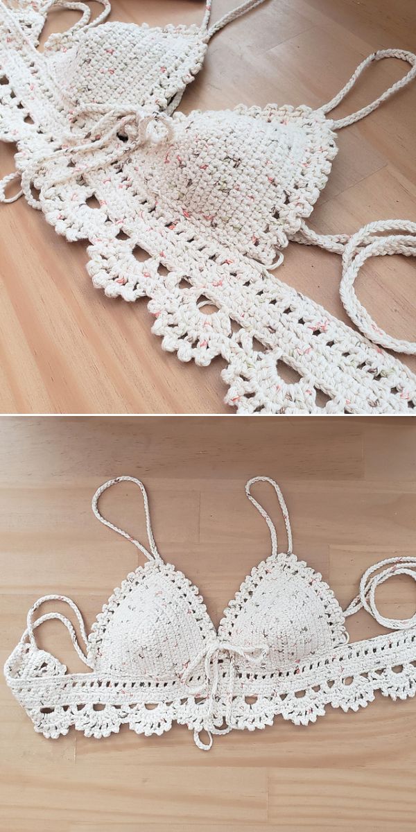 A handmade white crochet crop top bralette with decorative edging and adjustable straps, displayed on a wooden surface.
