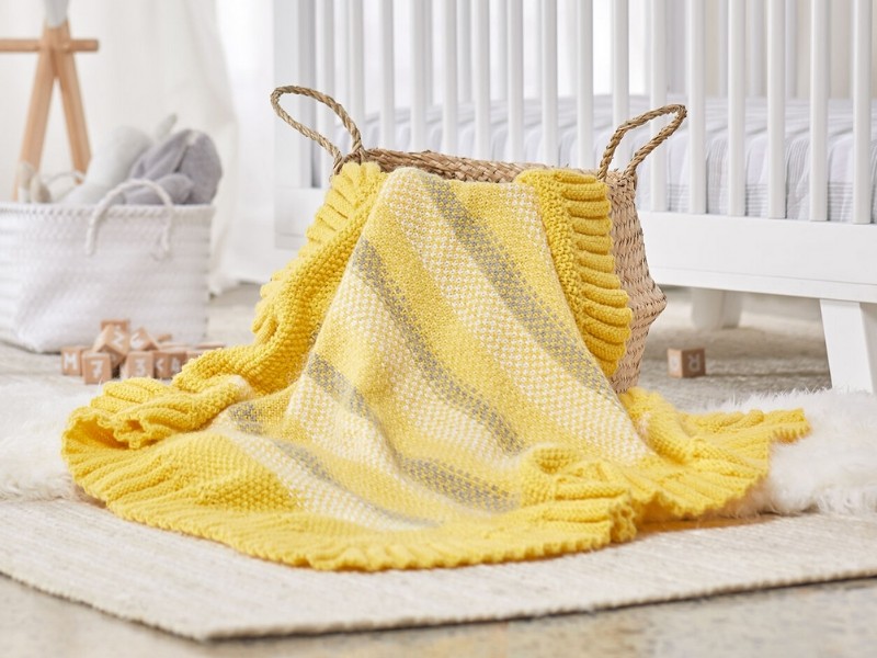 Blanket Stitch Trim Blanket pattern by Yarnspirations Design Studio -  Ravelry