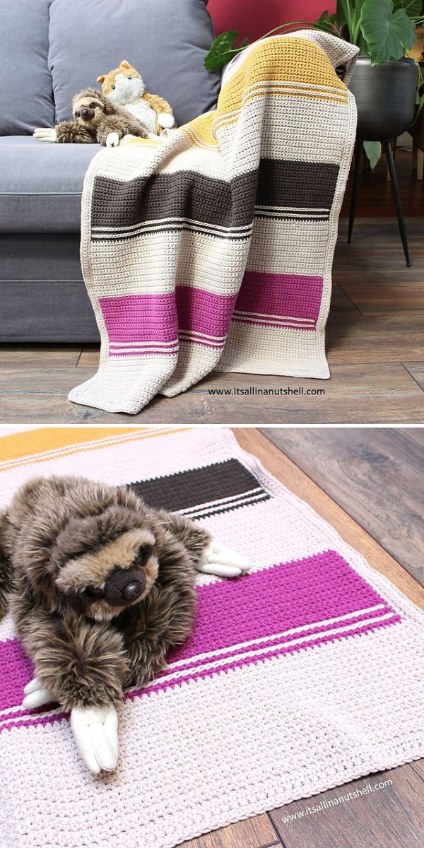 striped crochet blanket in white, purple, grey and yellow on the couch and the floor