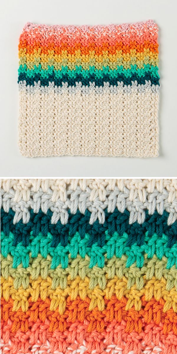 A crocheted Half Moon Shawl with a rainbow pattern.