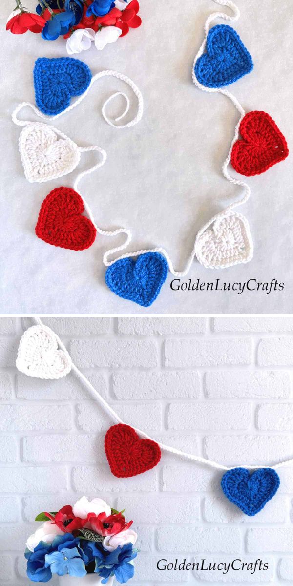 Crocheted garland with red, white, and blue hearts displayed on a white surface and hanging against a white brick wall, with artificial flowers and crochet bottle holders nearby.