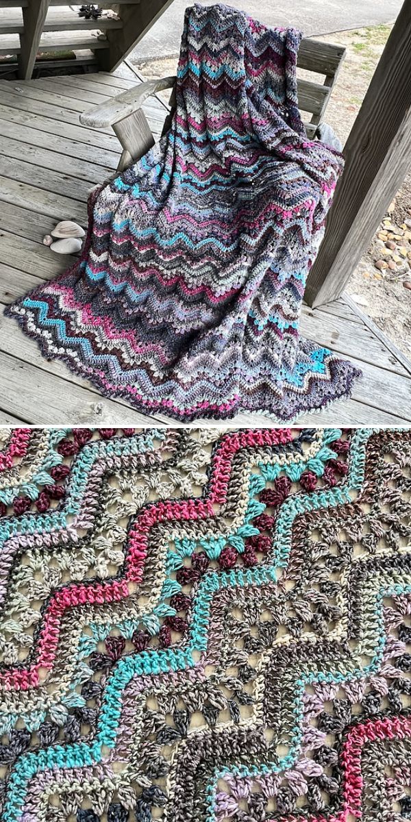 A chevron crocheted afghan displayed on a wooden bench.