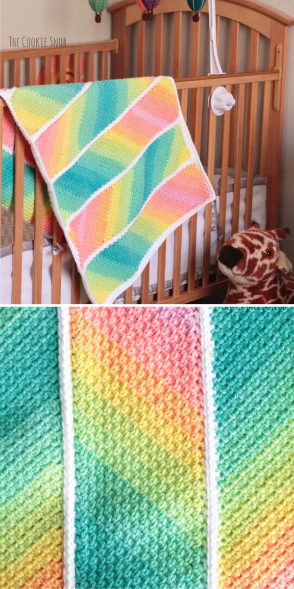 A rainbow striped linen stitch baby blanket with a baby in a crib.