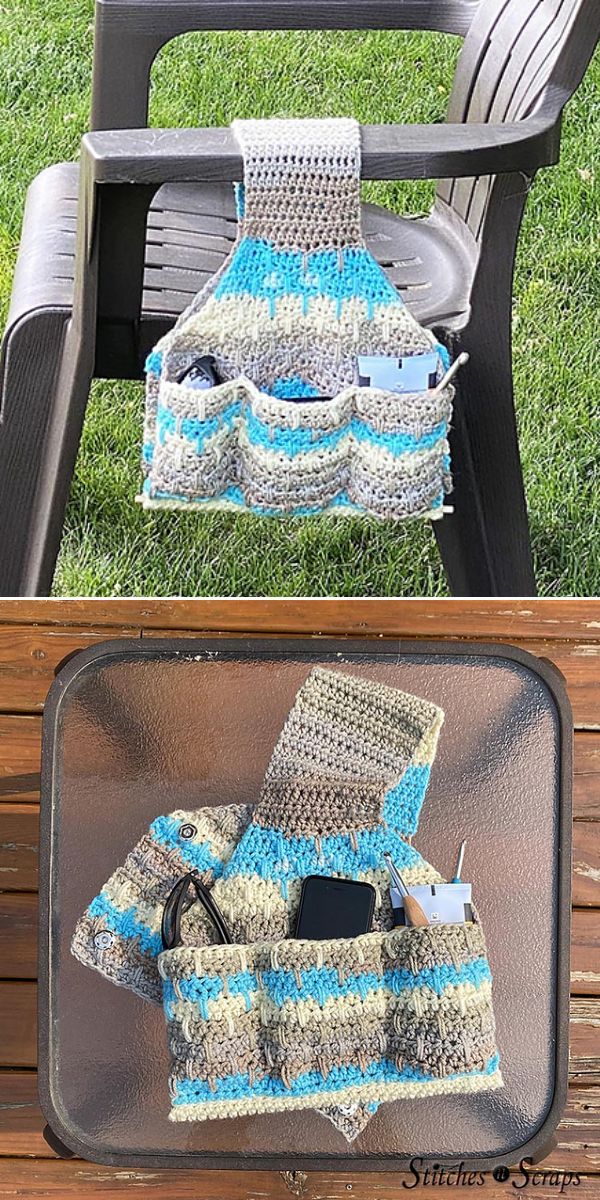 Crocheted armrest organizer with multiple pockets holding gadgets, draped over a plastic chair arm and displayed on a glass table.