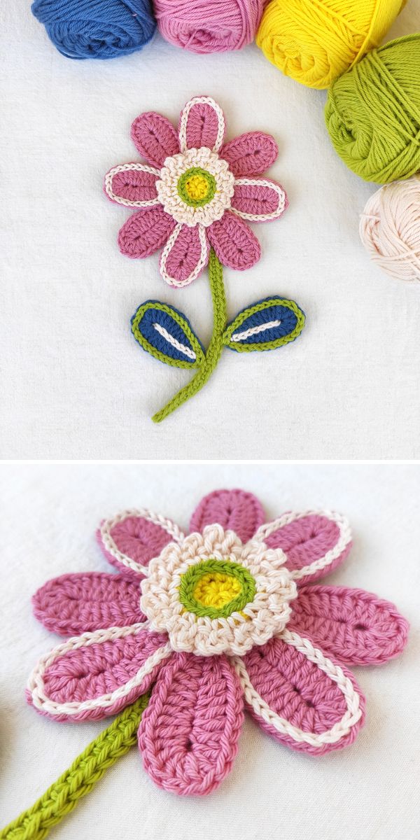 Crocheted flowers and yarn on a table.
