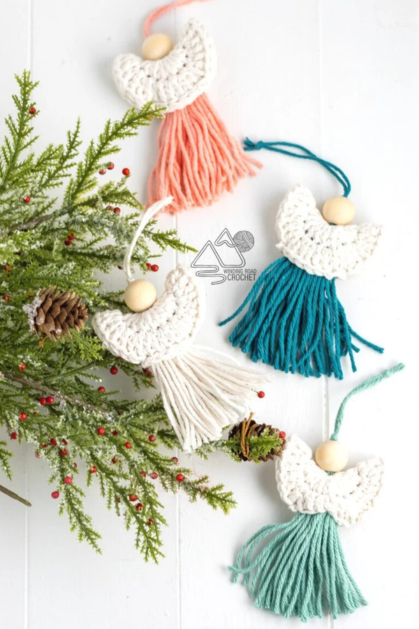Crochet angel ornaments with tassels and pine cones.