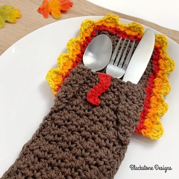 https://stateless.woolpatterns.com/2023/11/90c4aebe-turkey-belly-flatware-holder-by-sonya-blackstone.jpg