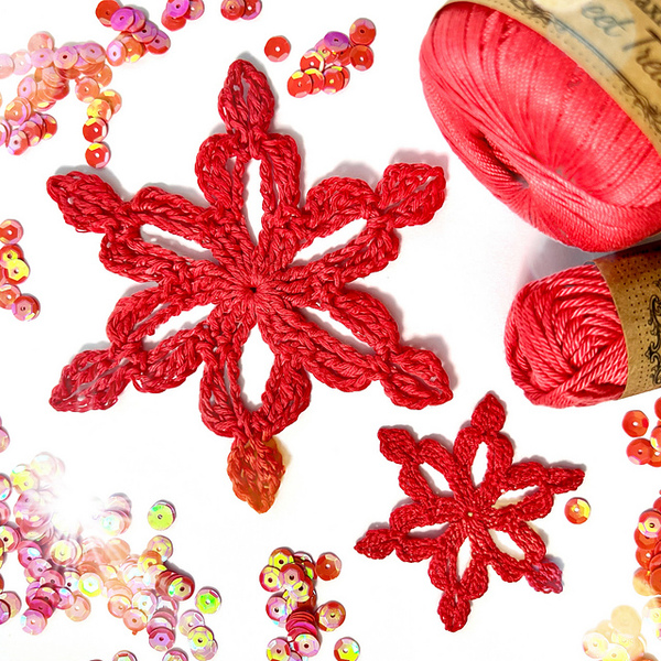 A red crocheted snowflake.