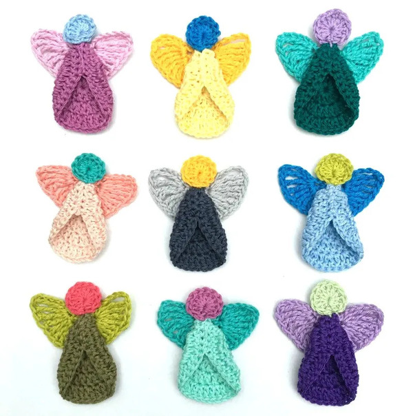 Crocheted angels in a variety of colors.