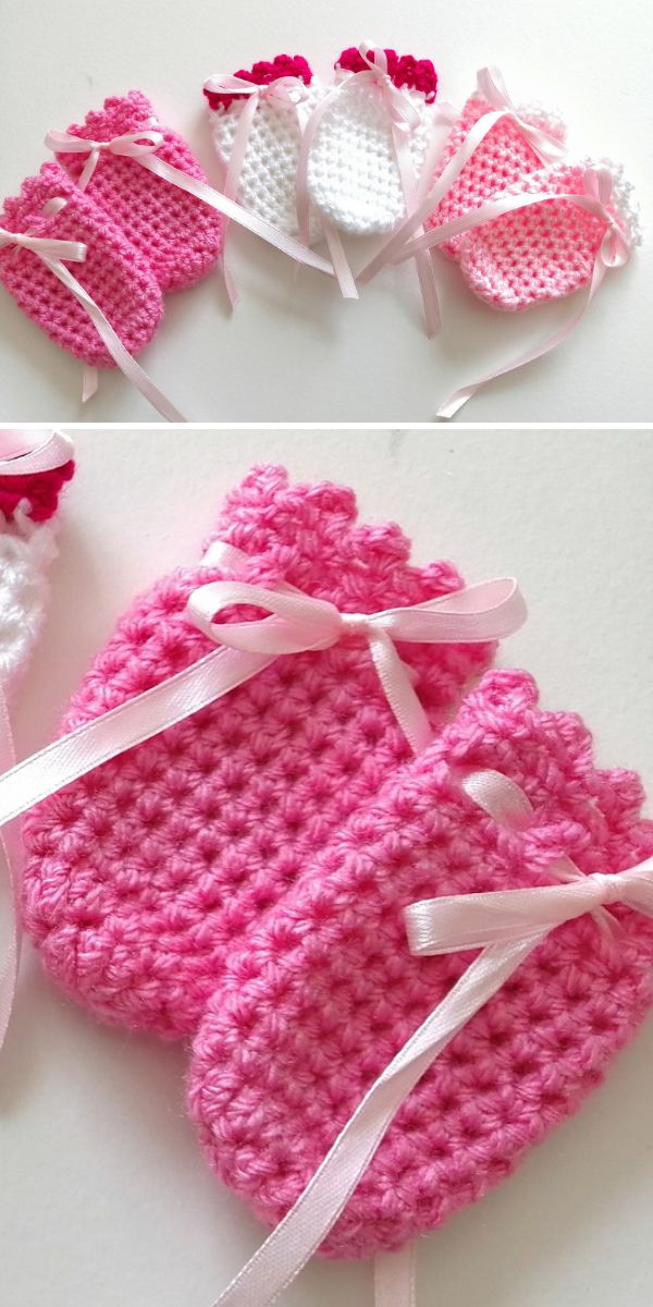 Crochet baby mittens with pink ribbons and bows.