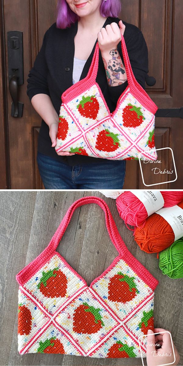 A person holding a handmade crochet bag with a strawberry pattern design.