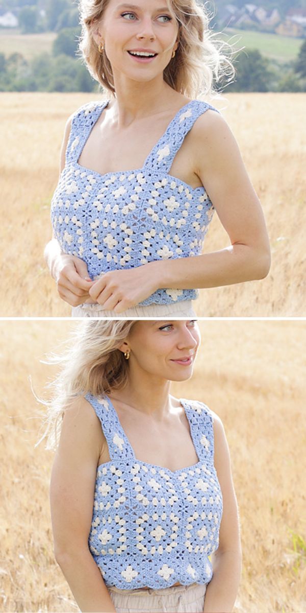 A woman in a blue and white patterned top and headband standing in a field.