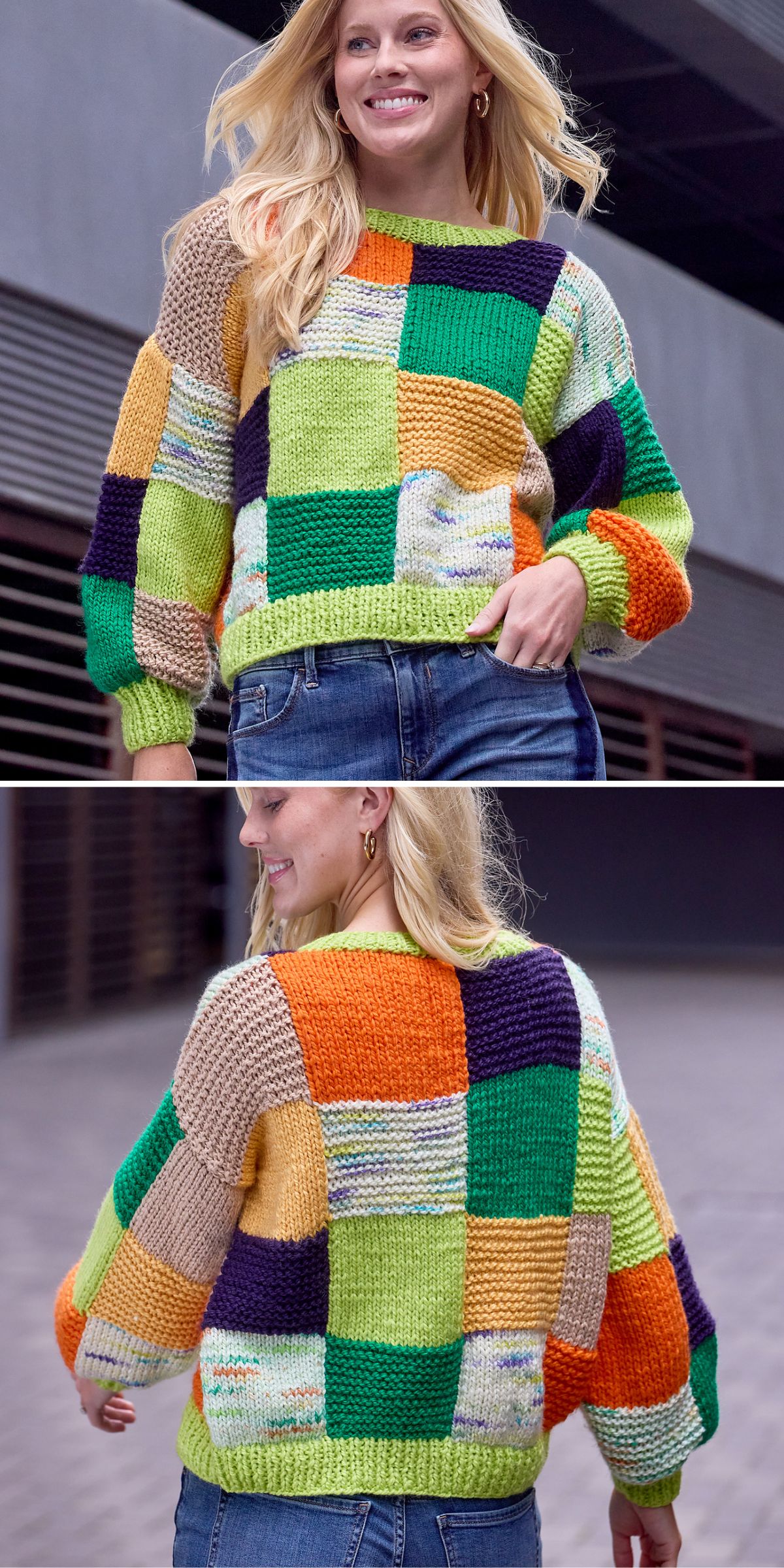 Person wearing a colorful patchwork knitted sweater in shades of green, orange, blue, and beige, paired with blue jeans, walking outside near a modern building.