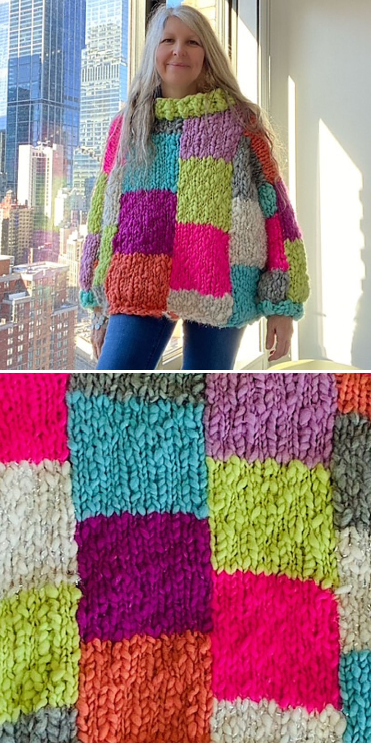 Person wearing a colorful patchwork knit sweater with a variety of textured squares, standing in a room with a cityscape view. Close-up shows the sweater's vibrant, chunky knit detail.