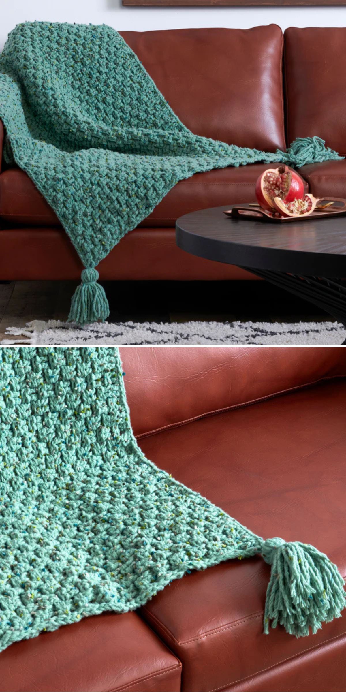 Green crochet blanket with tassels draped over a brown leather couch. A sliced pomegranate is on the round table nearby.
