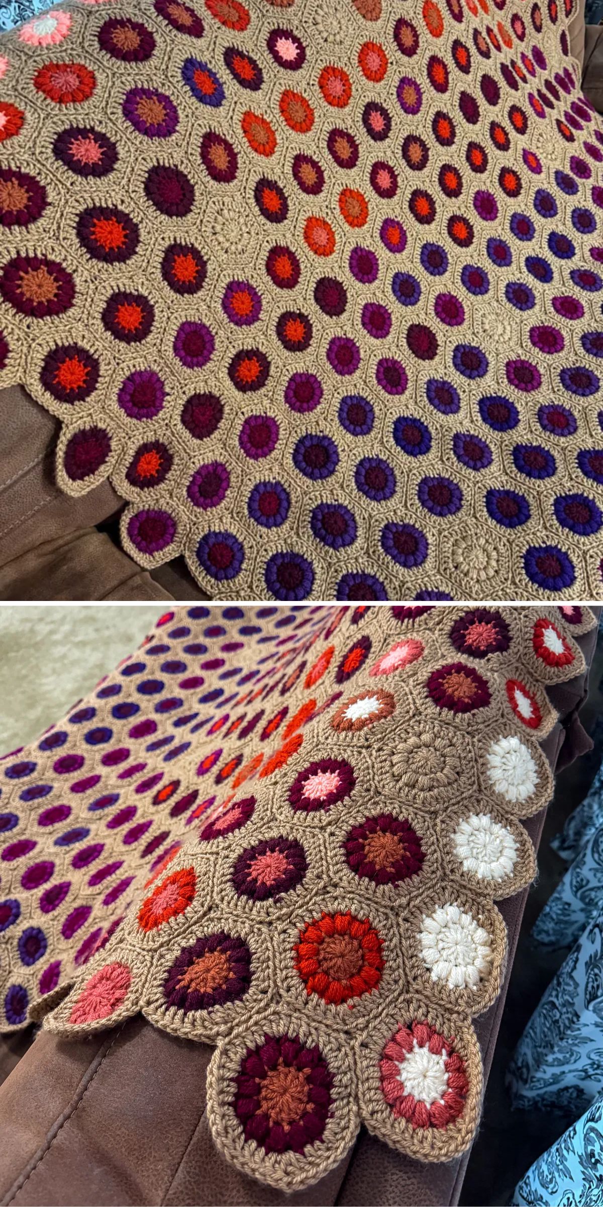 A crochet blanket with circular patterns in shades of red, purple, orange, and white, draped over a couch.