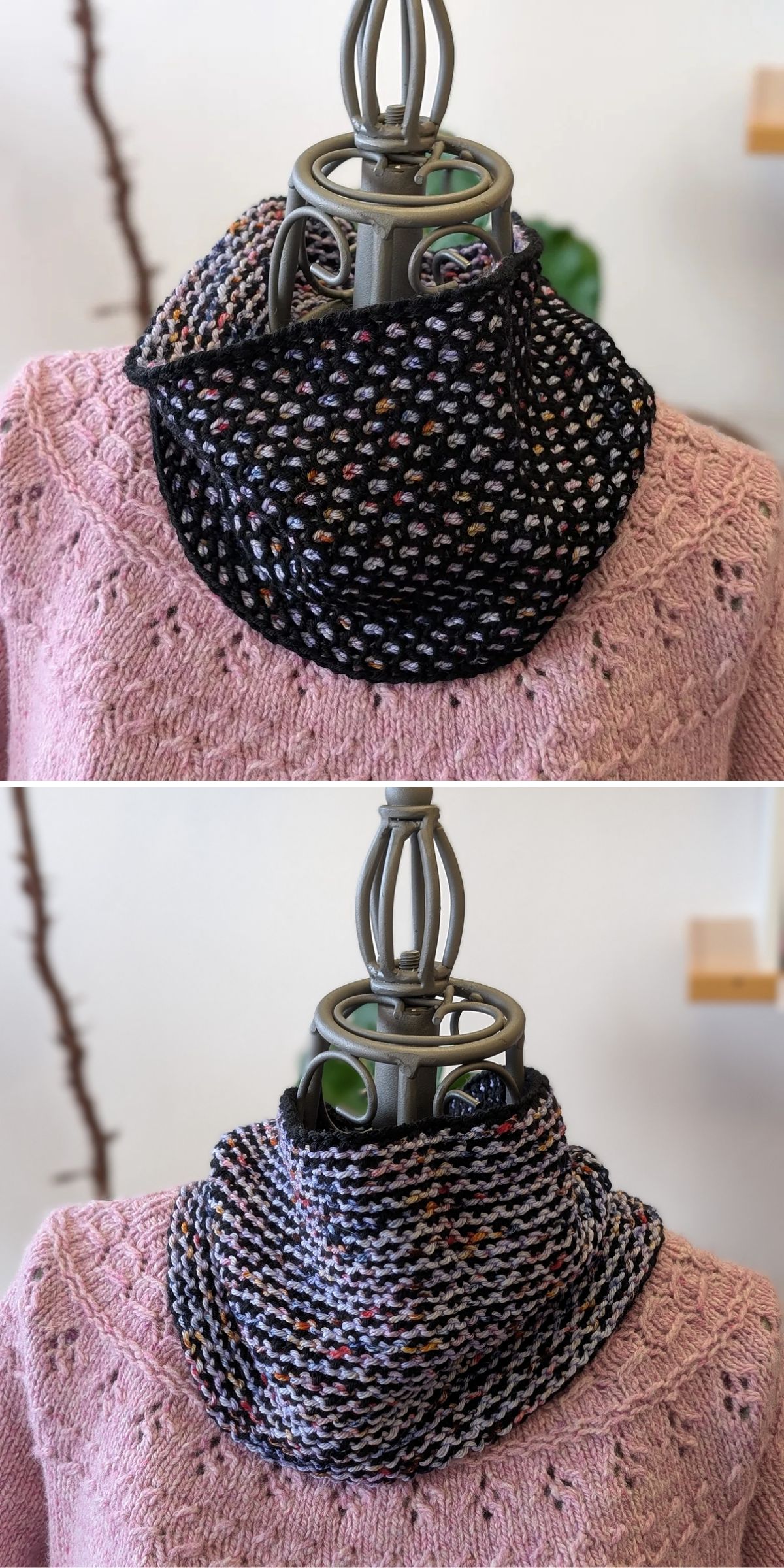 Two photos of a mannequin dressed in a pink knitted sweater, displaying a reversible knitted cowl in black and multicolored patterns with different sides facing outward.