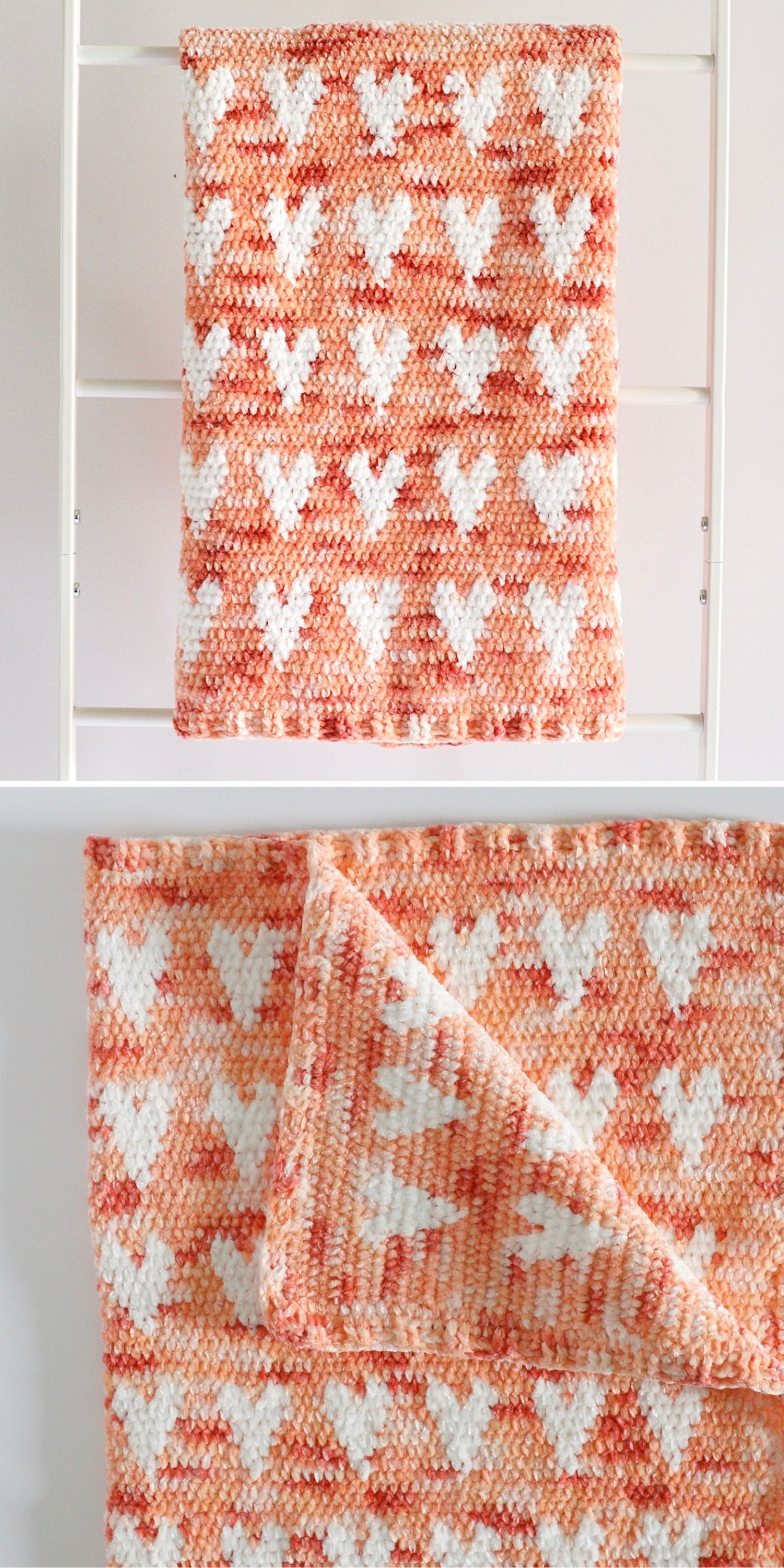 A crocheted blanket with an orange and white heart pattern is displayed folded on a white rack and laid flat, showing both sides of the design.