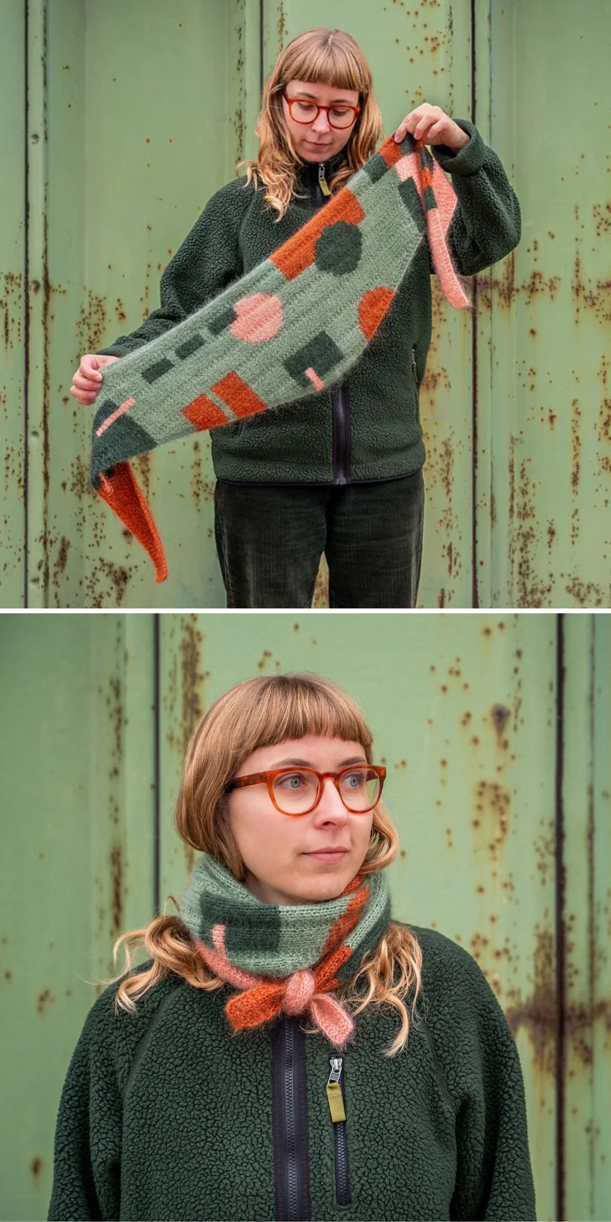 A person wearing glasses displays a green, orange, and pink patterned knit scarf, then wears it wrapped around their neck, standing in front of a weathered green metal door.