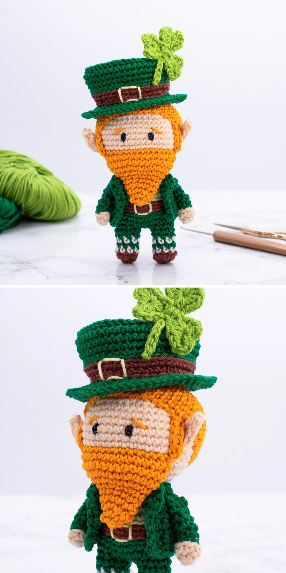 Crocheted leprechaun doll with an orange beard, green suit, tall hat with a shamrock, photographed next to green yarn and a crochet hook on a white surface.