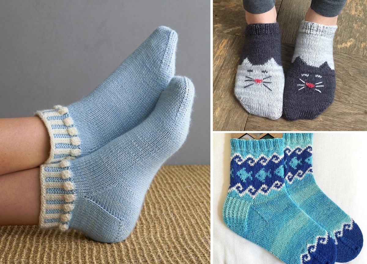 Three pairs of knitted socks: plain light blue, gray with cat faces, and blue patterned with geometric designs, shown on feet and laying flat.