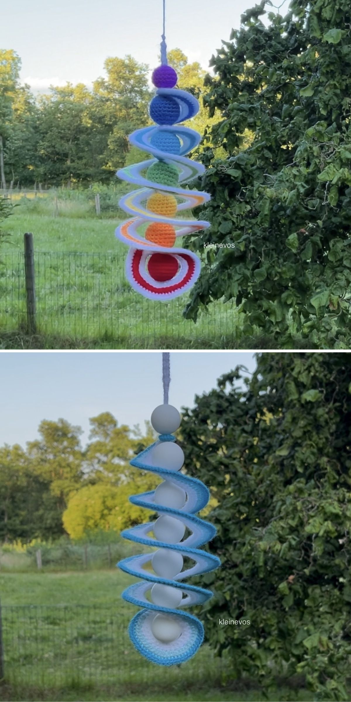 Two hanging crocheted spirals, one in rainbow colors with a red center, the other in blue and white with white beads, are displayed outdoors near trees and a fence.
