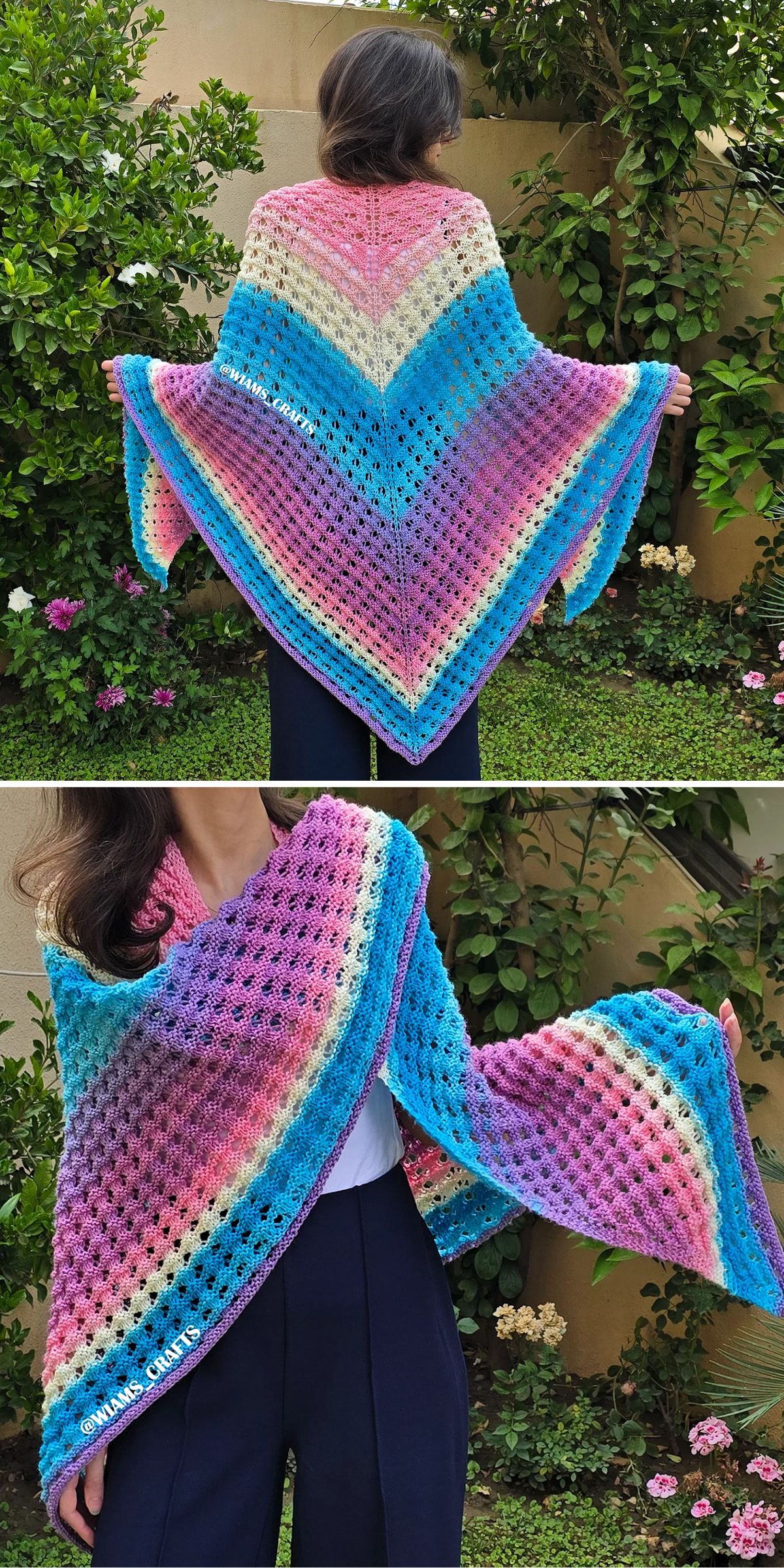 Person displays a large, colorful, crochet shawl with a chevron pattern in shades of pink, blue, yellow, and purple, outdoors near green foliage.