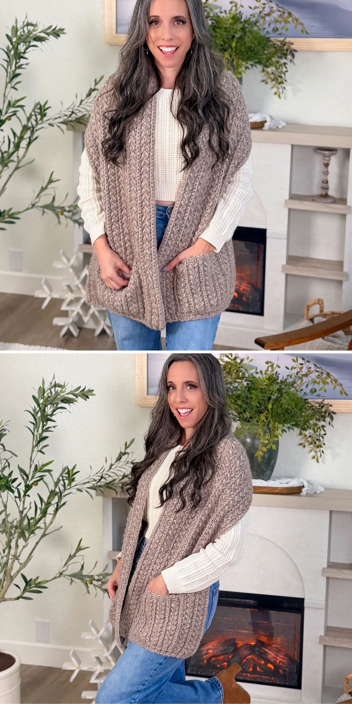 Woman with long dark hair wears a cream sweater, chunky knit taupe vest, and blue jeans, standing indoors by a fireplace and plants.
