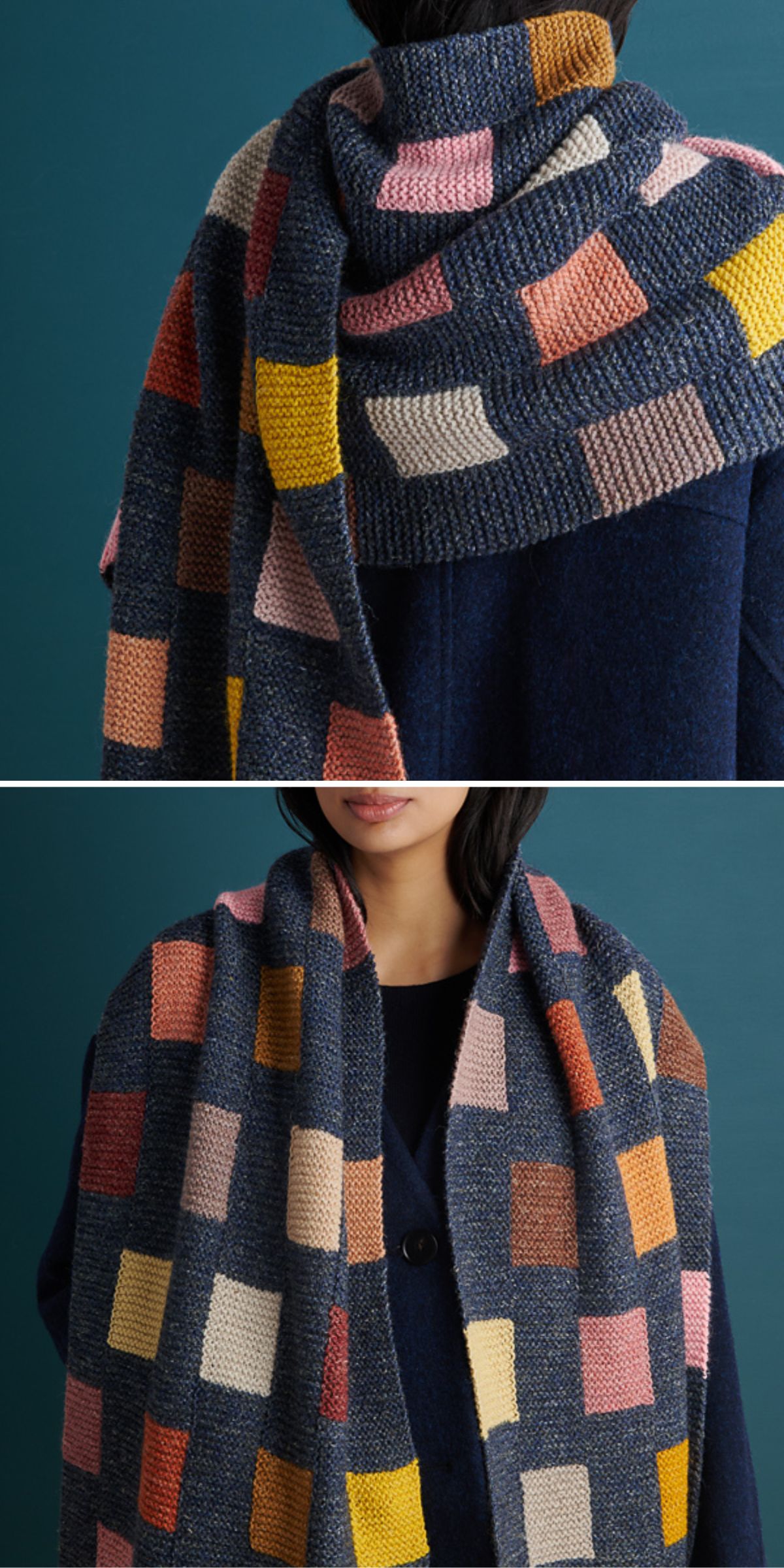 A person wears a navy blue coat and a knitted scarf with a geometric pattern of multicolored squares in pink, yellow, orange, and beige tones.